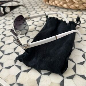 Chanel sunglasses. Minor imperfections on white sidearm